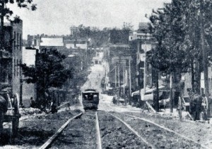 Frank Sprague's original electric streetcars travel up a Richmond, Virginia hill.