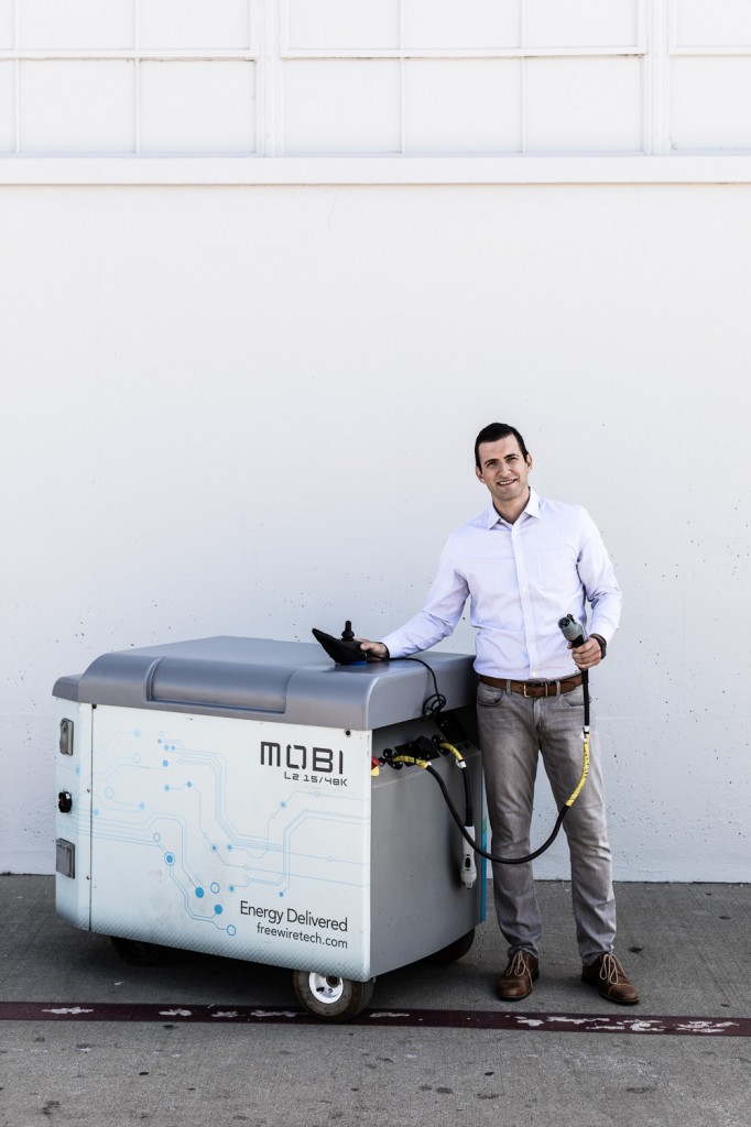Arcady Sosinov, CEO & Founder of FreeWire, poses with the Mobi unit in San Leandro